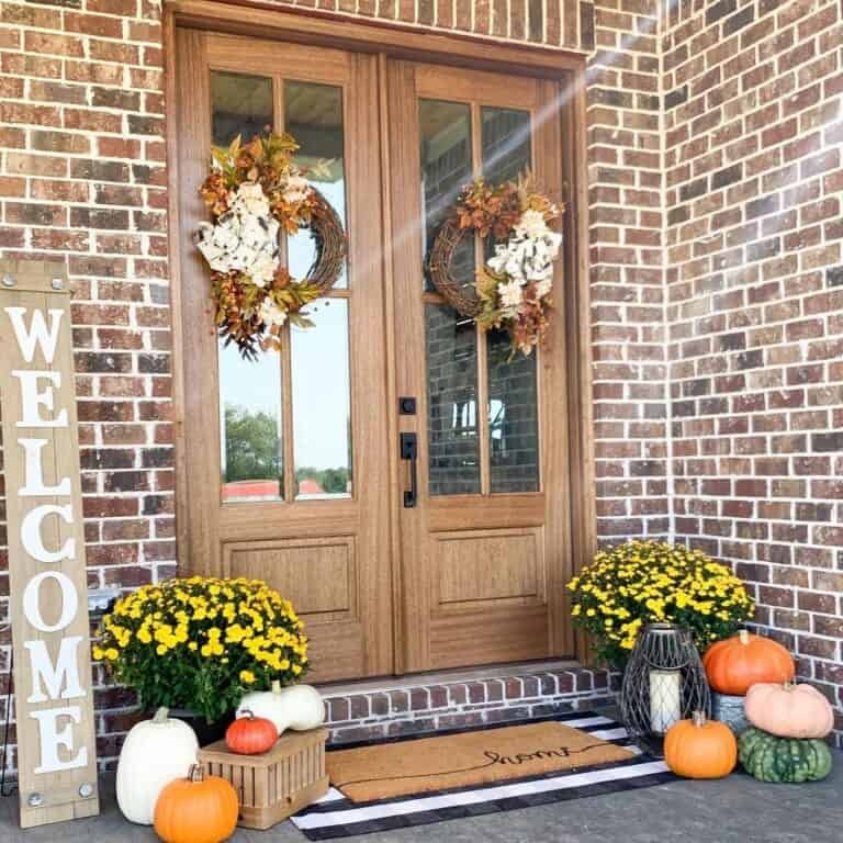 Wooden doors with grapevine wreaths