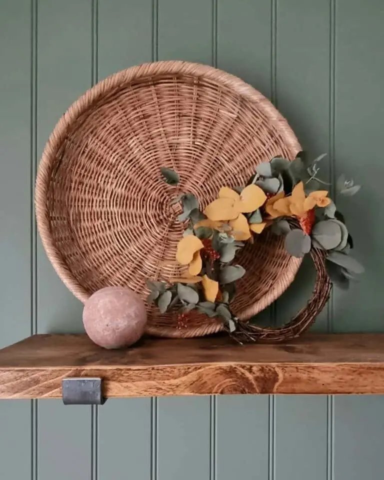 Wooden shelf with grapevine wreath