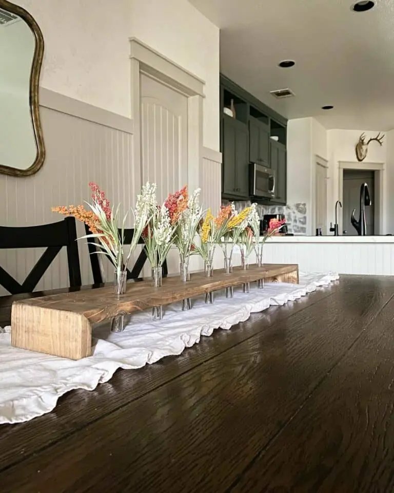 Wooden table with colorful fall blooms